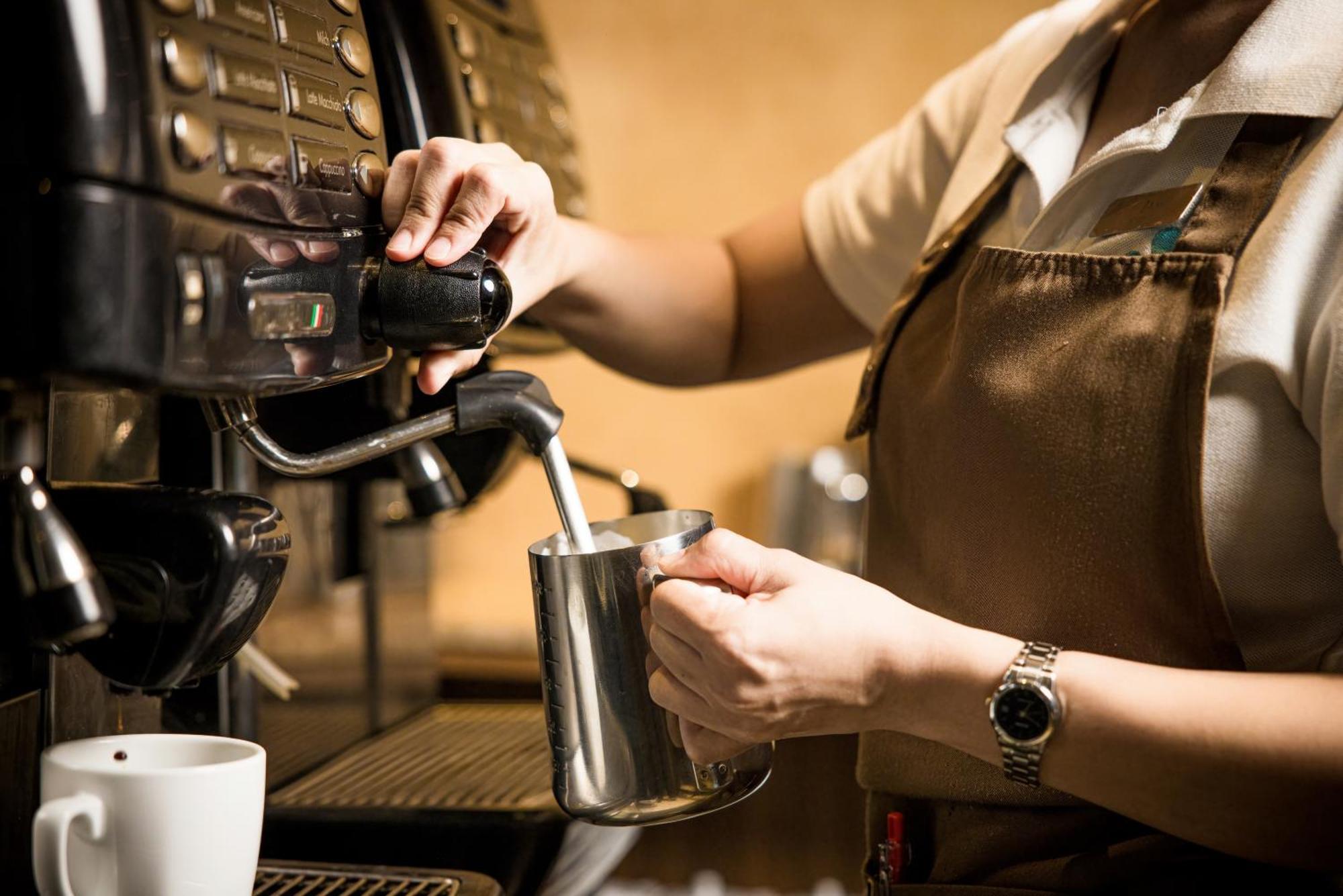 Grand Mercure Phuket Patong Ngoại thất bức ảnh A barista making coffee