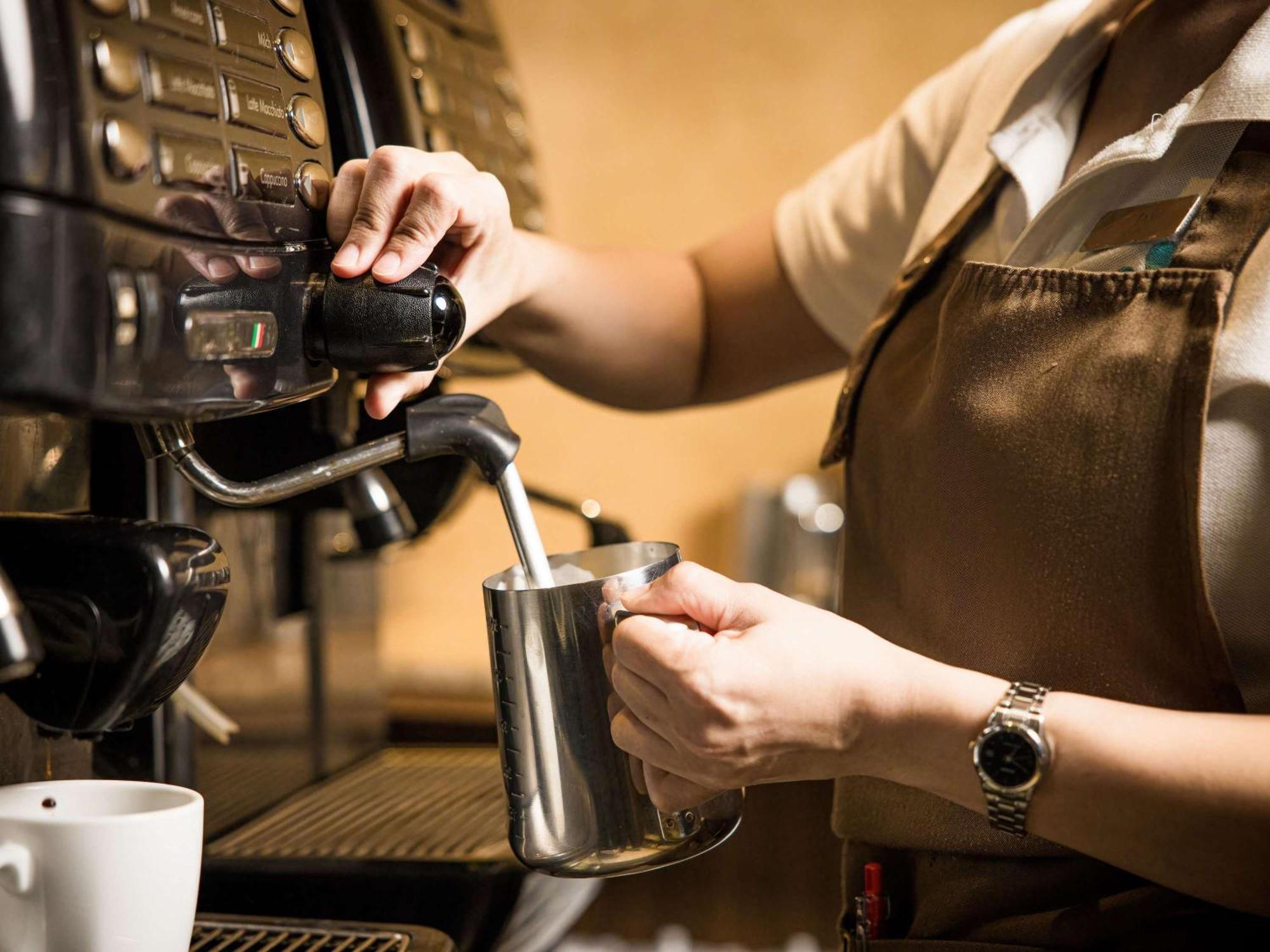 Grand Mercure Phuket Patong Ngoại thất bức ảnh A barista making espresso